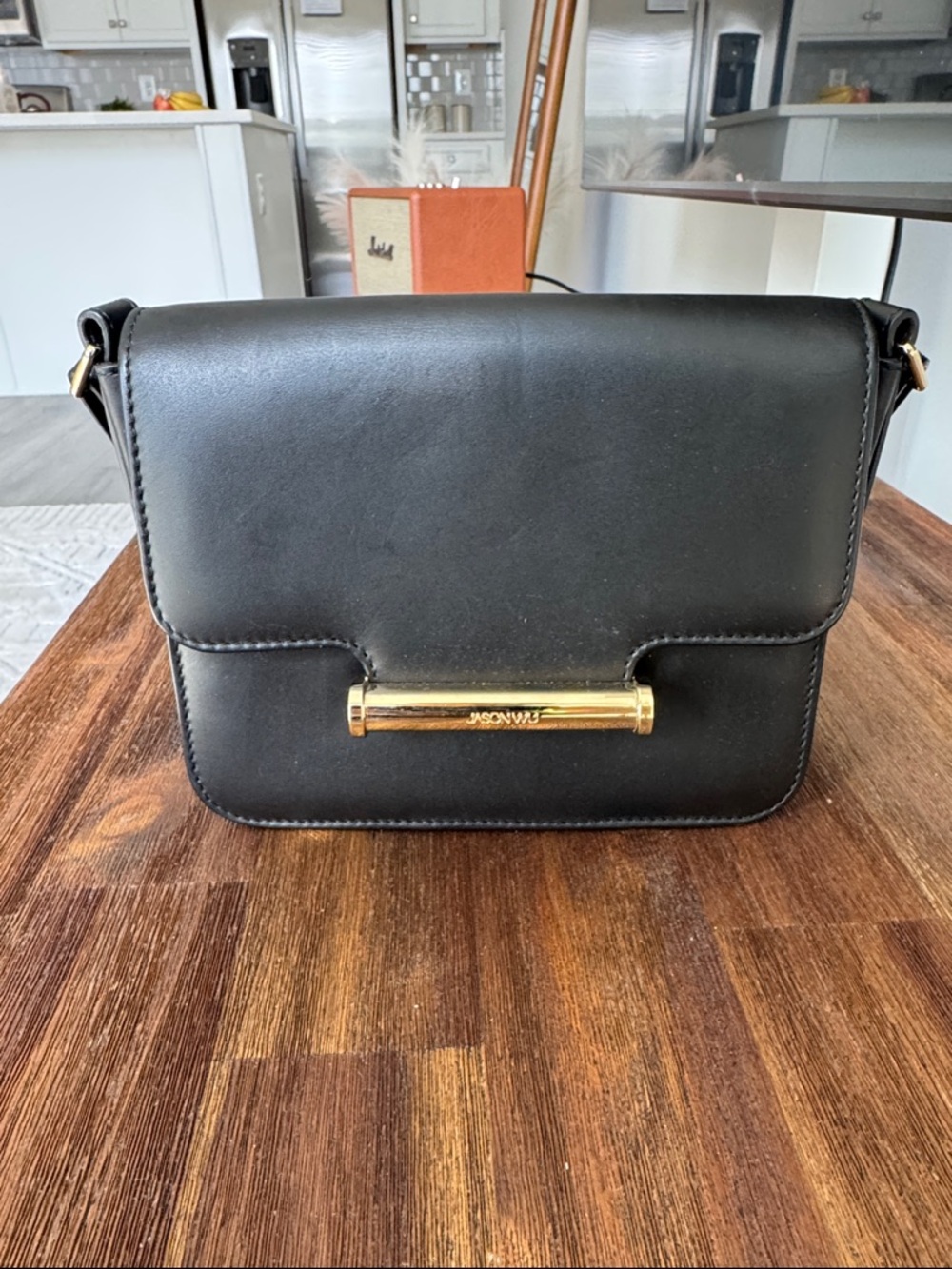 Jason Wu- Black Leather Crossbody Bag with Gold Bar Accent